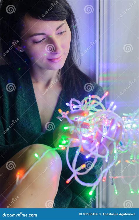 Portrait Of White Caucasian Woman With A Festive Garland Stock Photo