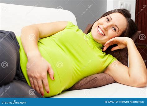 Pregnant Woman Lying On The Sofa At Home Stock Image Image Of Couch Beauty 23937159
