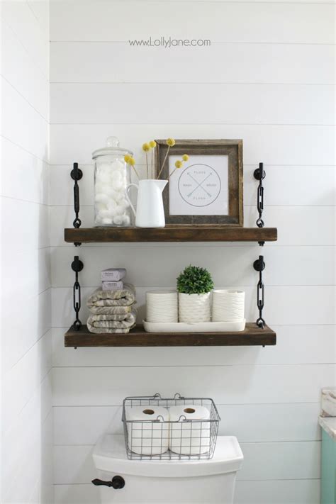 On the other side, you can have an open cabinet or shelf design for decorative pieces like plants, succulents, and photos. DIY Turnbuckle Shelf - A Great Bathroom Addition - Lolly Jane