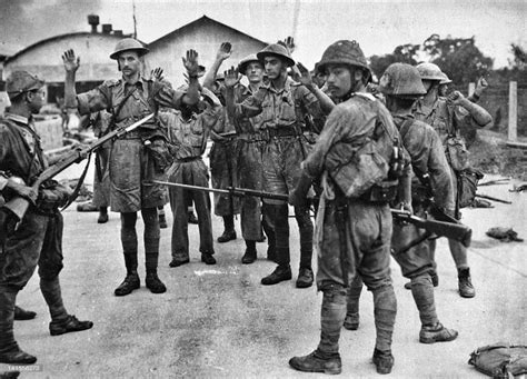 We associate it with naval battles, jungle warfare, atomic bombings of hiroshima. British Soldiers Surrender to the Japanese Army during the ...