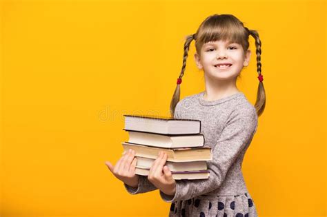 Beautiful School Girl Holding Books Stock Photo Image Of