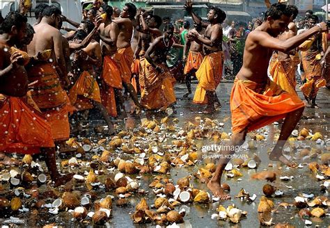 Sri Lankan Tamil Hindu Devotees Smash Coconuts On The Ground During