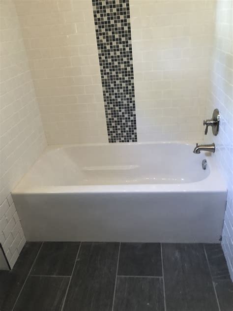Designers suggest using a subway tile in the shower area or around your bathtub but there are certainly more ways to implement it in the bathroom interior decoration. white subway tile with accent waterfall | Bathroom renos ...