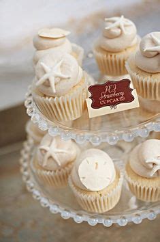 From our wedding experts at style me pretty, a gallery of delightful confections to inspire. Beach Themed Wedding Starfish Sea Shells Cupcake Wrappers ...