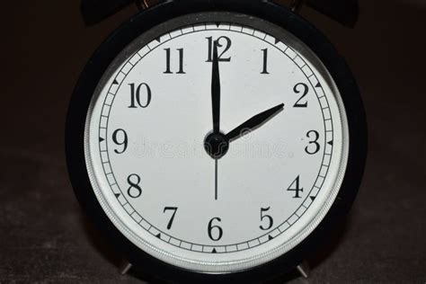 Clock Pointing To Different Times Stock Photo Image Of Background