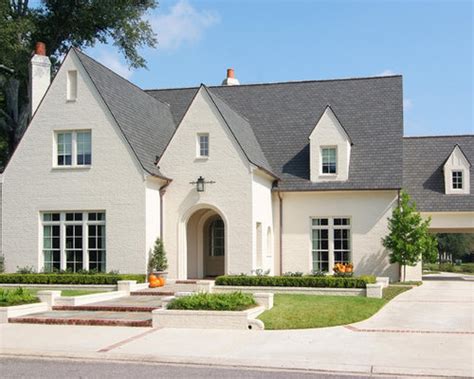 Brown contemporary two floor brick house exterior in london with a pitched roof. White Brick Design Ideas & Remodel Pictures | Houzz