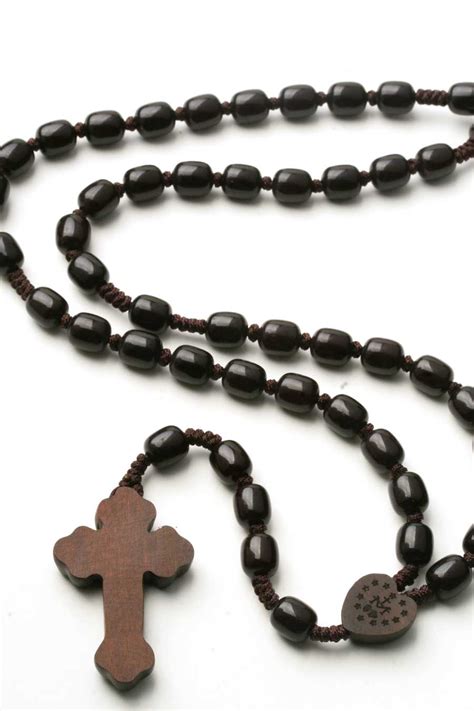 Mar 31, 2013 · the catholic rosary has 59 beads with sections of 10 beads called decades. Jujube Wood Catholic Rosary Beads on Cord