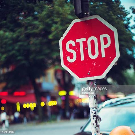 Car Stop Sign Photos And Premium High Res Pictures Getty Images