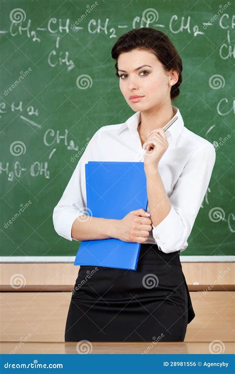 Serious Teacher At The Blackboard Royalty Free Stock Image Image