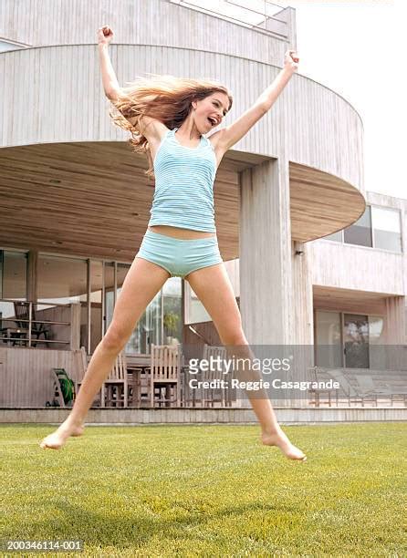 Girl Doing Jumping Jacks Photos And Premium High Res Pictures Getty