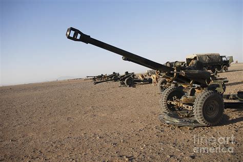 Howitzer 105mm Light Guns Are Lined Photograph By Andrew Chittock