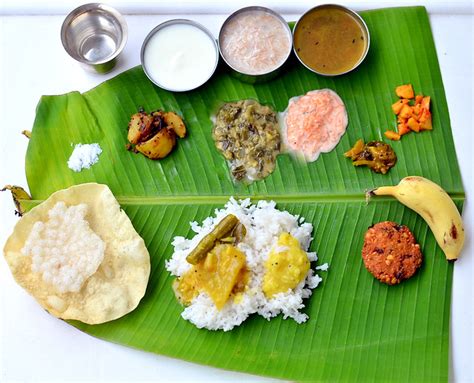 There is a host, typically a south indian delicacy like thengai thuvaiyal or coconut chutney, chili chutney or milagai the food is served on a plantain leaf or banana leaf piece. South Indian Full Meals-Lunch Menu For Guests-Thalai ...