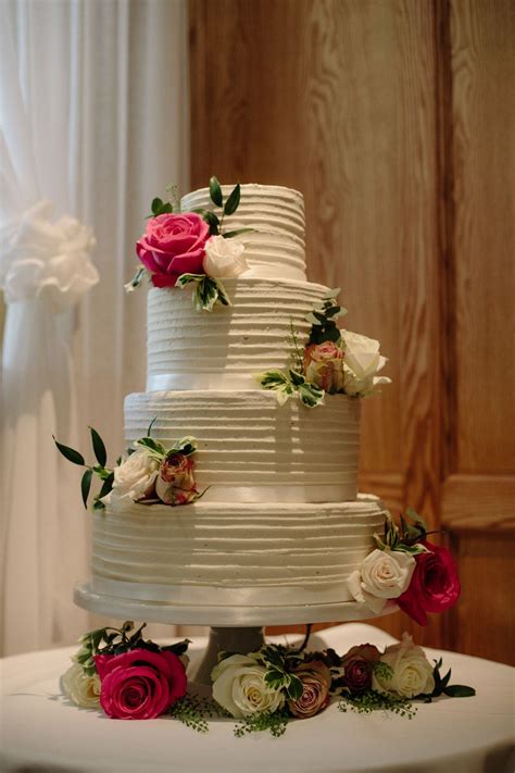 justin alexander for a traditional wedding in north yorkshire stunning white wedding cake with
