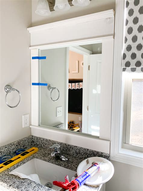 Diy How To Frame A Builder Grade Bathroom Mirror Home And Hallow