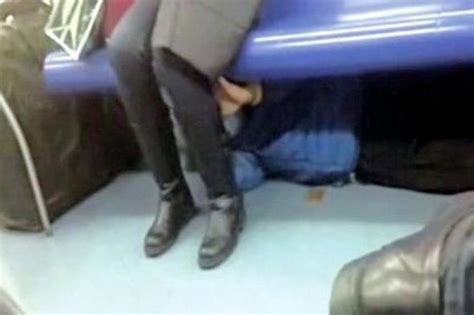 Pervert Pictured Lying Under Train Seats Touching Womens Legs