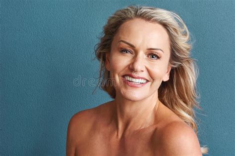 Carefree Beauty Studio Portrait Of An Attractive Mature Woman Posing