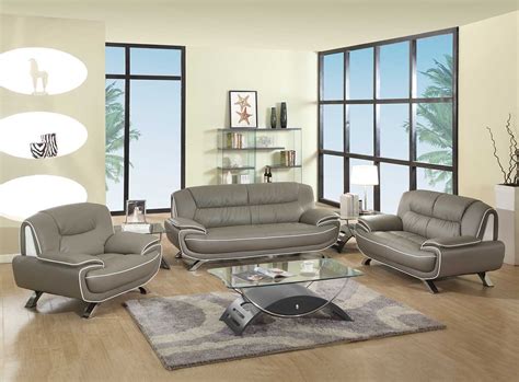 This living room offers a gray sofa set along with brown seats and a large center table, all under the stunning tall ceiling. 504 Modern Italian Leather Sofa Set Grey - Leather Sofa ...