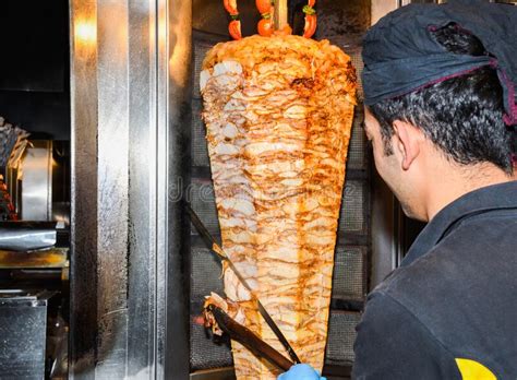 Chicken shawarma is a middle eastern dish actually made with chicken slices grilled on a vertical spit (rotisserie) then cut off to fill the pita bread. Shawarma, Roasted On A Slowly-turning Vertical Rotisserie ...