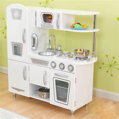 A mud kitchen is a wonderful way to get children involved in the environment, and there's no better example than this solid wood kitchen. KidKraft Vintage Kitchen & Reviews | Wayfair