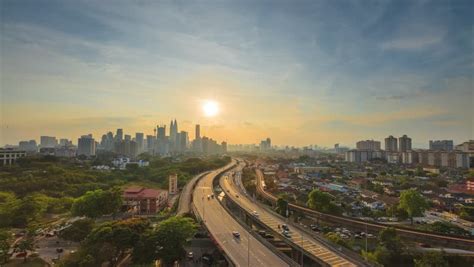 Current time and date for kuala lumpur. Time lapse view of Kuala Lumpur City Centre during a ...