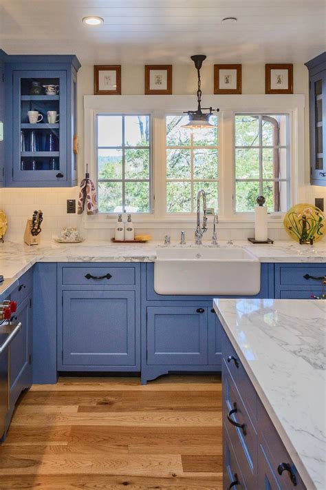 Browse kitchen countertop pictures from hgtv remodels to see dark color countertop ideas. Blue Kitchen Cabinets With White Countertops Design Ideas