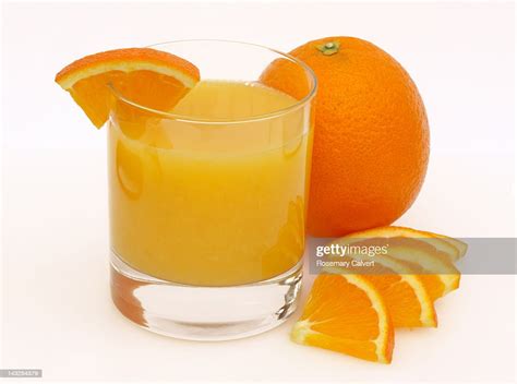 Freshly Squeezed Orange Juice Ready To Drink High Res Stock Photo