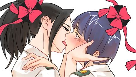 Two Anime Characters Kissing Each Other With Red Bows On Their Heads And Hair In Ponytails