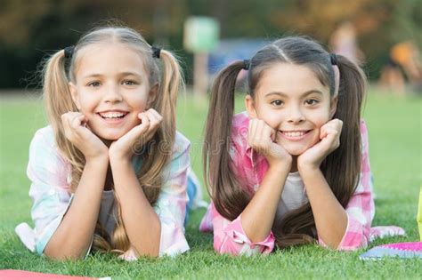 Cute Smiling Kids Sisters Relax Green Grass Happy Childhood Concept
