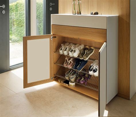 It has two enclosed cabinets for keeping shoes out of sight. Shoe Cabinet for hallways | Entryway shoe storage, Closet ...