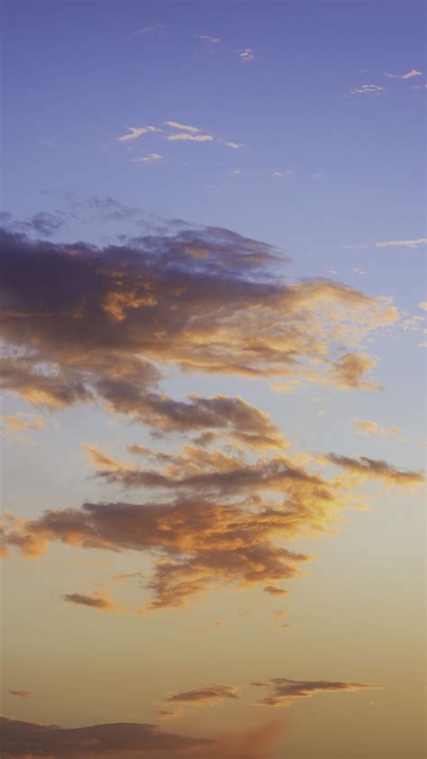 Download Wallpaper 938x1668 Clouds Sky Sunset Beautiful