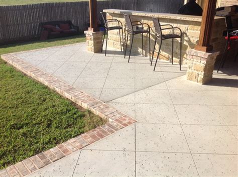 A brick edge on a driveway is done like any other brick edge, it is on a 4 inch thick concrete slab with a setting bed of mortar and a mortar joint. Rock Salt Finish Concrete w/Brick Border