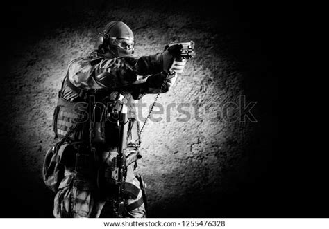 Special Unit Soldier Stands Pistol His Stock Photo 1255476328