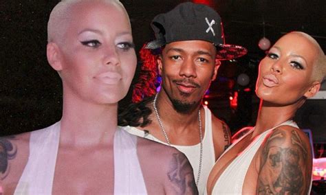 Nick cannon new tattoo very beautiful back tattoo nick. Amber Rose supports Nick Cannon's DJ gig as she showcases ...