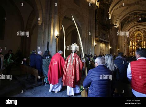 Two Priests Enter The Cathedral Basilica Of The Assumption For The