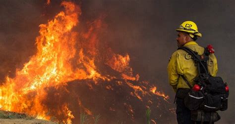 A rapid, persistent chemical change that releases heat and light and is accompanied by flame. Gender Reveal Party Pyrotechnics Sparked El Dorado Wildfire