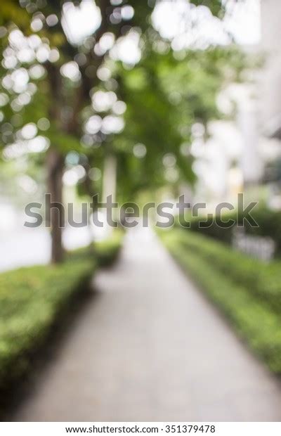 Blurred Background Blurred Straight Sidewalk Green Stock Photo Edit
