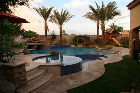 Backyard Oasis Pool Spa Swim Up Bar Grotto Slides And Water