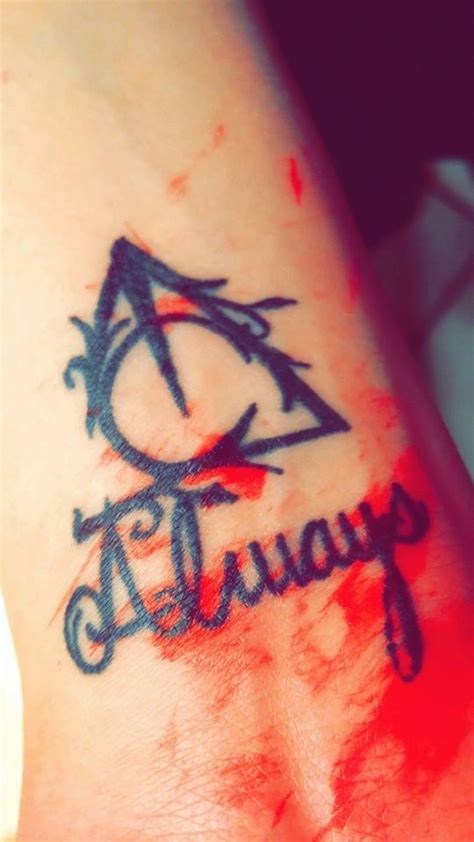 They are a trio of objects fabled to have been made by the symbol of the deathly hallows is a circle (symbolizing the stone), sliced down the middle with a line (symbolizing the wand), and surrounded by. Deathly Hallows Always tattoo | Always tattoo, Tattoos ...