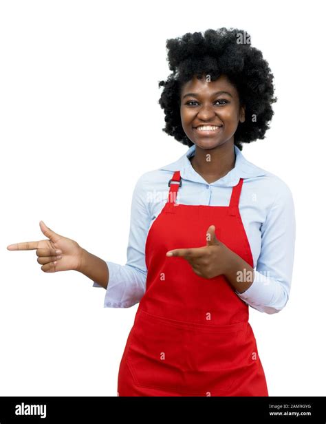 African American Waitress With Red Apron Pointing Sideways On Isolated