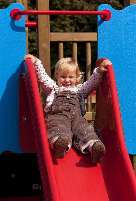 Happy Little Girl On Slide Stock Photo Image Of Person 46247514