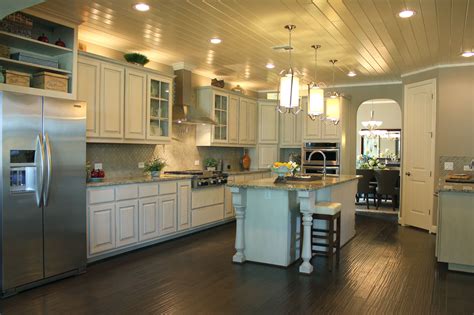 There are several types of trim available for the top of kitchen cabinets. Kitchen Photos - Burrows Cabinets - central Texas builder-direct custom cabinets