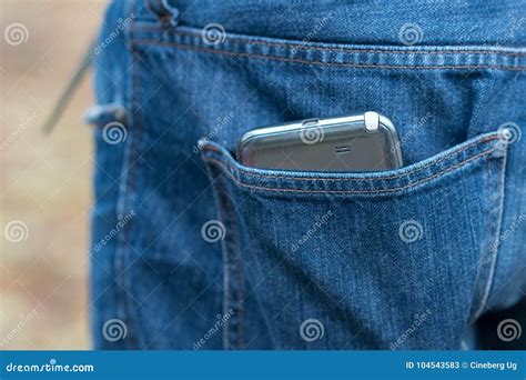 Smartphone In Faded Jeans Pocket Stock Image Image Of Rear Thief