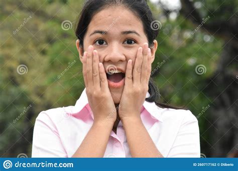 A Startled Asian Girl Youth Outdoors Stock Photo Image Of Girl