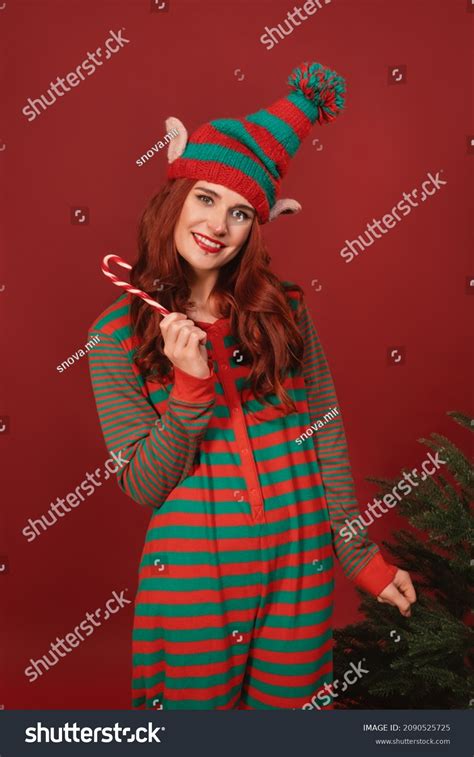 Sexy Santas Helper Woman Celebrating Christmas Stock Photo