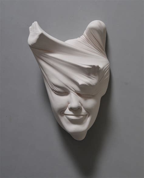 Surreal Sculptures Of Contorted Clay Faces Reinterpret Reality