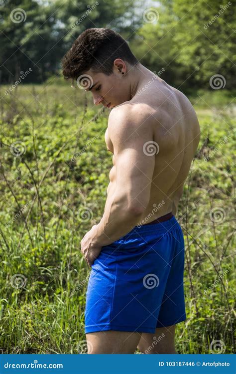 Young Muscular Shirtless Hunk Man Outdoor In Nature Stock Photo Image