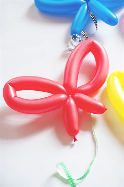 Do you know how to pop your ears? Balloon Bows • A Subtle Revelry