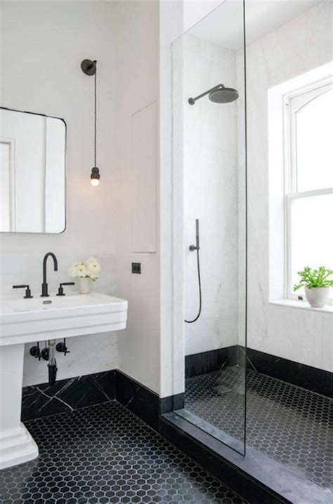 Tiled bathrooms can be simple but effective. Steal This Look: A Classic NYC Bathroom with a Modern Edge ...