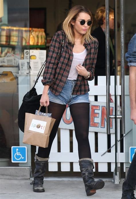 Miley Cyrus Dresses Like Normal Person In Denim Shorts And Slouch Boots