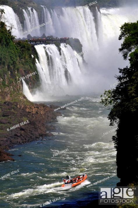macuco safari raft boat going up iguassu river floriano falls in brazil side taken from